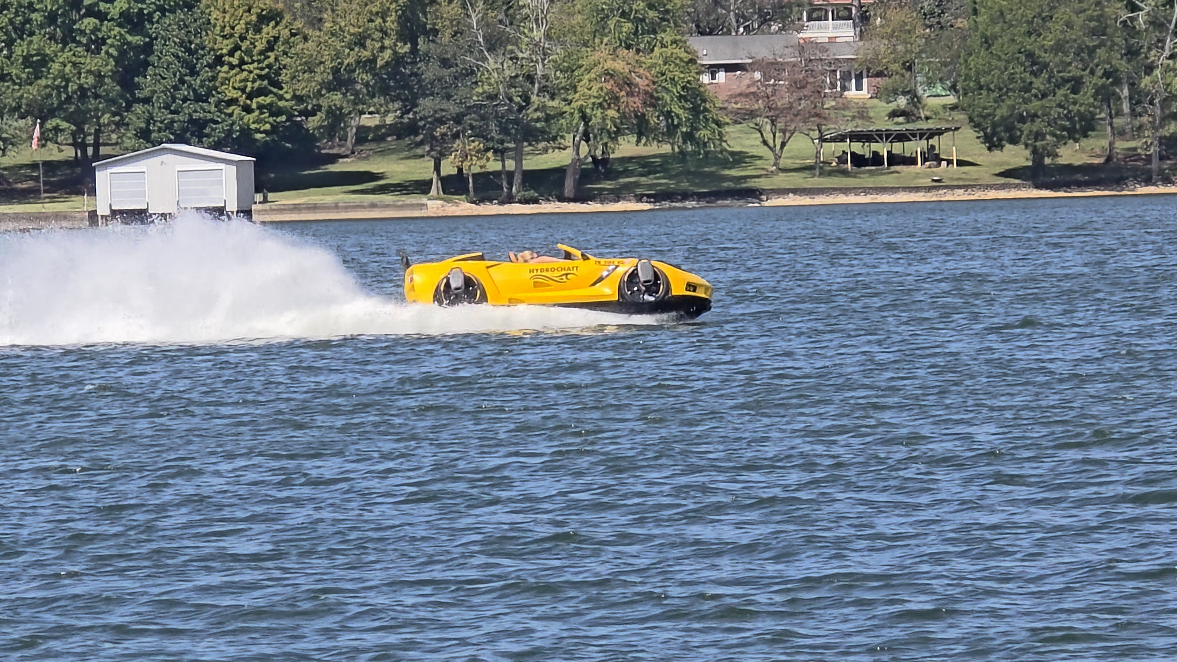 JetCar racing across Tennessee River at high speed